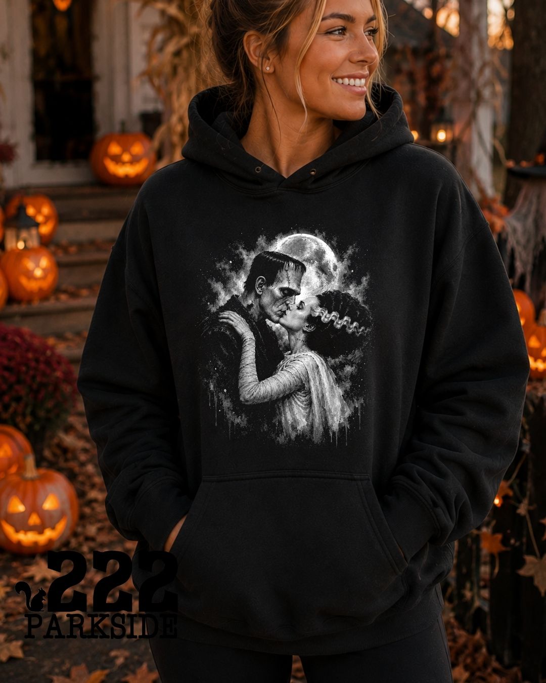 Monsters in Love Frankenstein graphic hoodie at a Halloween pumpkin display